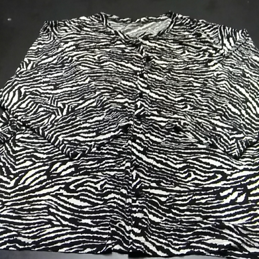 A Black/White Zebra print button down top